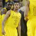 Michigan junior Tim Hardaway Jr. and sophomore Trey Burke huddle up during a break in the action against Indiana during the first half at Crisler Center on Sunday, March 10, 2013. Melanie Maxwell I AnnArbor.com